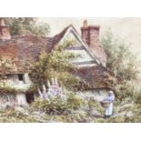 W Carter, pair watercolours, A cottage garden with a woman holding a basket, signed lower left, and