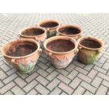Five similar terracotta garden urns with swag decorations approx 39cm height x 47cm diameter and a s