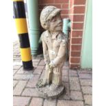 Concrete garden ornament of a boy playing cricket 66cm high