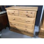 Modern pine chest of two short and three long drawers, 106cm wide x 50cm deep x 104.5cm high