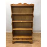 Pine waterfall bookcase with open shelves and two drawers below, 78cm wide, 38cm deep, 150cm high