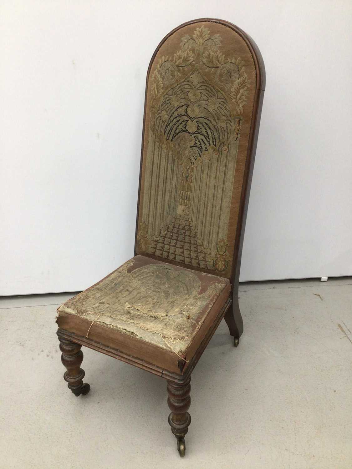 Victorian rosewood prie dieu chair with arched back on turned front legs with original tapestry upho