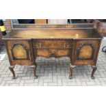 Good quality walnut sideboard with raised ledge back, two central drawers below flanked by cupboards