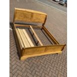 Contemporary light oak double bed with side rails and slats 190cm wide