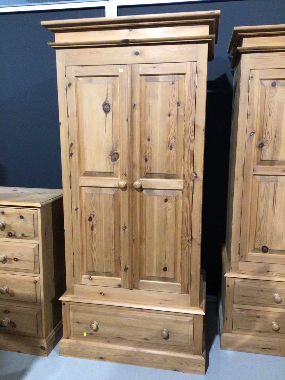 Modern pine double wardrobe with two panelled doors and drawer below, 97.5cm wide x 63cm deep x 208.