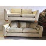 Contemporary three piece suite with pale yellow upholstery comprising a pair of two seater settees 2