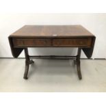 Late 19th century Georgian-style mahogany sofa table with twin flaps flanking two drawers, on splaye