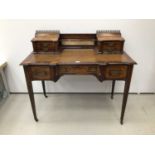 Edwardian rosewood amd inlaid desk by James Schoolbred and Co