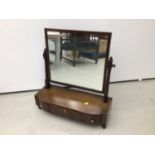 19th century mahogany toilet mirror with three drawers below on turned legs, 59cm wide x 65.5cm high