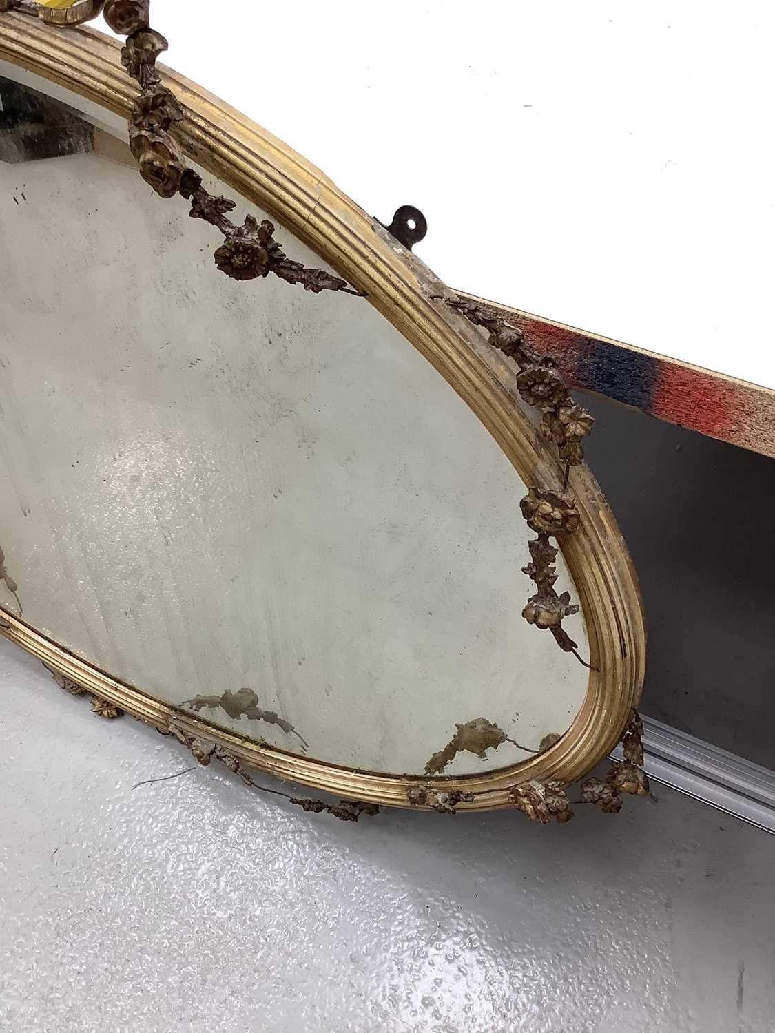Oval wall mirror in ornate gilt frame with ribbon and swag decoration, 100cm x 77cm - Image 2 of 4