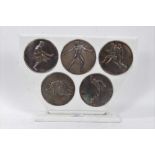 Five silver Greek roundels, by Antigone Filippaki each circular embossed disc representing athletic