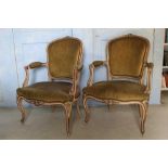 Pair of early 20th century French salon open elbow chairs