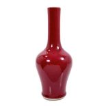 Chinese sang-de-boeuf glazed bottle vase, Kangxi mark to base but 19th/20th century, 24.5cm high