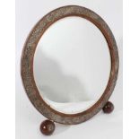 Late 19th/early 20th century table mirror of circular form, with bevelled mirror plate,