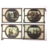 Four 18th / 19th century stained glass panels, each with a circular reserve depicting figures repres
