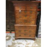 Mid 18th century red walnut chest on chest, the upper section with two short and three long drawers