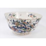 18th century Dutch polychrome Delft bowl, painted in the chinoiserie style with exotic birds and
