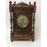 Late 19th century Continental musical bracket clock with silvered dial, the movement with 8 bells an
