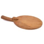 Peter 'Rabbitman' Heap of Wetwang, oak cheese board of oval form with carved Rabbit signature to the