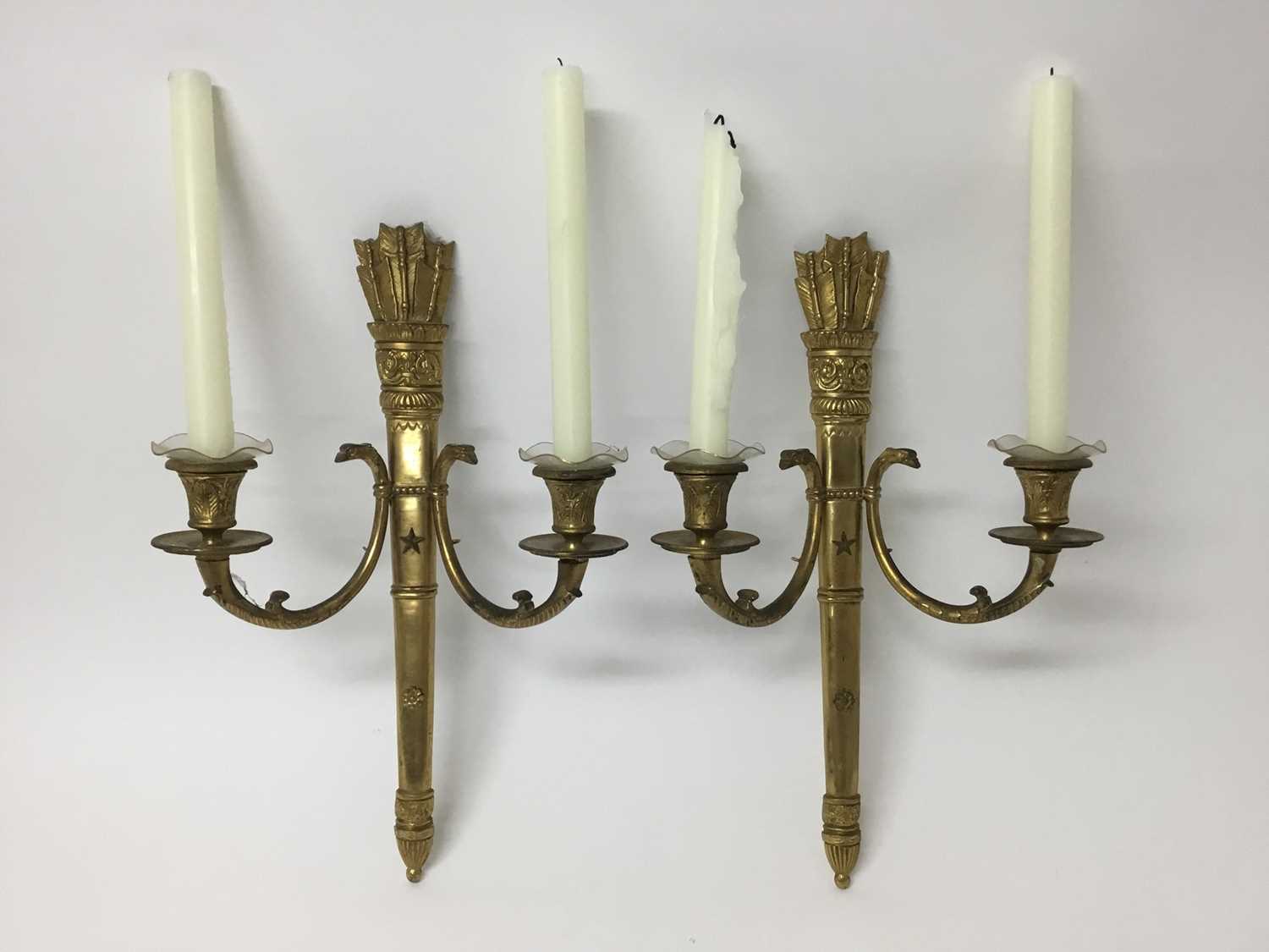 Pair of Empire style gilt metal twin branch wall lights