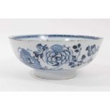 18th century English blue and white delftware bowl, painted with flowers in the Oriental style, 22.5