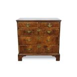 Rare George I yew and fruitwood veneered chest of two short and three long drawers with original bra