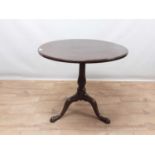 George III mahogany tripod wine table, the snap-top on shaped columns and three splayed legs, 73cm d