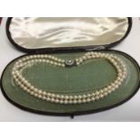 Cultured pearl two strand necklace in a Victorian necklace box