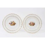 Pair of Derby plates painted with baskets of fruit by George Complin, marks to back, 22.25cm diamete