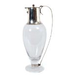 Contemporary silver mounted claret jug, with clear glass body