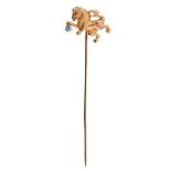 Gold and diamond stick pin in the form of a lion rampant holding an old cut diamond, stamped 14k. Th