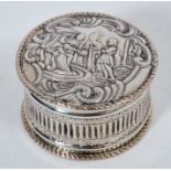 Late 19th/early 20th century white metal box of circular form, with gilded interior