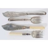 Pair of Victorian silver fish servers with engraved and pierced silver blades and silver handles