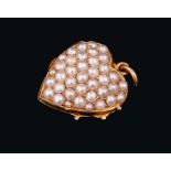 Victorian 15ct gold and seed pearl heart shape pendant locket, the front with pavé set seed pearls a