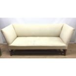 George III style sofa upholstered in cream material on mahogany square chamfered legs joined by stre