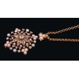 Large Victorian diamond and pearl pendant/brooch, the flower head design with a central cushion-shap