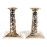 Pair of late 19th century Chinese Export silver candlesticks,