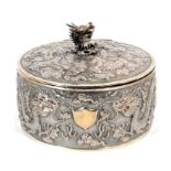 Late 19th/early 20th century Chinese Export silver box of circular form, with dragon decoration