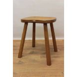 Robert Mouseman Thompson oak stool, with saddle seat, signature mouse to one side