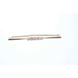 Edwardian diamond five stone bar brooch with a line of five graduated old cut diamonds in platinum m