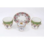 Pair of Paris Feuillet porcelain planters, painted with floral sprays on a green and gilt-patterned