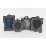 Three silver photograph frames and one other silver plate