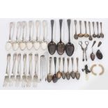 Selection of Georgian and later silver flatware and a baby's rattle.