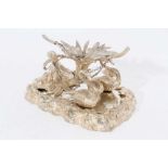 Victorian silver plated table centrepiece modelled as a putto with two Swans.