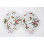 Pair of Worcester cabbage leaf dishes, c.1760-65, painted in the Rogers style with floral sprays, 26