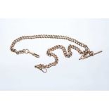 Edwardian 9ct rose gold watch chain with hollow curb links, 39cm length.
