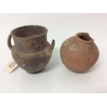 Small ancient twin handled black glazed amphora, middle Bronze Age, together with a small Romano-Egy