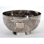 19th century Chinese Export silver bowl of circular form, with embossed floral decoration,