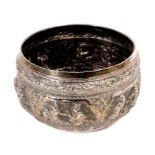 Late 19th/early 20th century Burmese silver bowl with raised scroll and leaf decoration