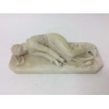Small 19th century carved alabaster reclining figure of St. Theresa of Avila
